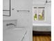 Modern bathroom with a marble vanity, a view of the city, and adjacent bedroom at 402 Chavis Way, Raleigh, NC 27601