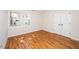 Empty bedroom featuring two windows and double closets at 4108 4108 Gallatree Ln, Raleigh, NC 27616