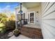 Covered front entrance with stairs and landscaping at 4108 4108 Gallatree Ln, Raleigh, NC 27616