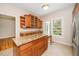 Open kitchen featuring an island and stainless steel appliances at 4108 4108 Gallatree Ln, Raleigh, NC 27616