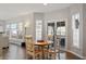 Charming breakfast nook featuring natural light, sliding doors, and backyard views at 4619 Paces Ferry Dr, Durham, NC 27712