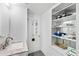 The bathroom features a neutral palette, including granite countertops and tiled floors at 4633 Edwards Mill Rd, Raleigh, NC 27612