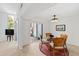 Dining area featuring modern table and lighting, with views of the courtyard at 4633 Edwards Mill Rd, Raleigh, NC 27612