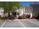 Apartment complex with landscaped grounds, and plenty of parking at 4633 Edwards Mill Rd, Raleigh, NC 27612