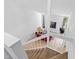 Bright living room with high ceilings, large windows and modern decor and stairwell at 4633 Edwards Mill Rd, Raleigh, NC 27612