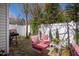 Cozy outdoor patio with outdoor furniture, stone flooring and a BBQ grill at 4633 Edwards Mill Rd, Raleigh, NC 27612