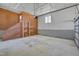 Spacious garage with concrete flooring, wood paneled walls, block foundation, and lots of open space at 501 Hiddenbrook Dr, Durham, NC 27703