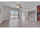 Open living space with sliding glass doors to deck provides outdoor access and backyard view at 501 Hiddenbrook Dr, Durham, NC 27703