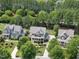 Aerial view of a neighborhood featuring well-maintained homes and lush greenery at 512 Hallburg Ct, Wake Forest, NC 27587