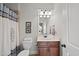 Bathroom featuring a shower and bathtub with a shower curtain, a toilet, and vanity at 512 Hallburg Ct, Wake Forest, NC 27587