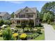 Beautiful two-story home with a manicured lawn and inviting front porch at 512 Hallburg Ct, Wake Forest, NC 27587