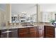 Kitchen featuring granite countertops, stainless appliances, and view to the living room at 512 Hallburg Ct, Wake Forest, NC 27587