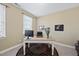 Home office featuring natural light, neutral paint, a writing desk, and a decorative area rug at 512 Hallburg Ct, Wake Forest, NC 27587