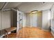 Finished attic space with wood flooring, unique lighting and floral trim at 529 Hillcrest Ave, Burlington, NC 27215