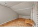 Functional attic space with unique flooring and decorative floral trim at 529 Hillcrest Ave, Burlington, NC 27215
