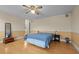 Spacious bedroom featuring hardwood floors, ceiling fan and natural lighting at 529 Hillcrest Ave, Burlington, NC 27215