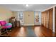 Bonus room featuring wood floors, two windows, and closet space at 529 Hillcrest Ave, Burlington, NC 27215