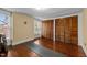 Well-lit bonus room featuring wood floors, natural lighting and closet space at 529 Hillcrest Ave, Burlington, NC 27215
