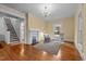 Cozy living room with hardwood floors, fireplace, and rocking chairs near a window with natural light at 529 Hillcrest Ave, Burlington, NC 27215