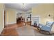 Inviting living room with hardwood floors, fireplace, and an open layout to the dining area at 529 Hillcrest Ave, Burlington, NC 27215