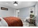 Comfortable bedroom featuring neutral tones, carpeted floor, and walk in closet at 5812 Timber Ridge Dr, Raleigh, NC 27609