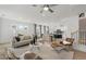 Open-concept living space filled with natural light, connects kitchen, dining, and living areas at 6002 Enclosure Way, Durham, NC 27703