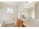 Bathroom featuring a vanity with a sink, a mirror, and a tub/shower combo at 627 Hastings Rd, Mebane, NC 27302