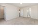 Carpeted bedroom showing walk in closet and door to ensuite bathroom at 627 Hastings Rd, Mebane, NC 27302