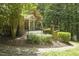 Charming front yard showcasing a well-manicured lawn, tasteful landscaping, and a inviting entrance at 6452 Therfield Dr, Raleigh, NC 27614