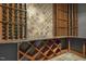 Well-organized wine cellar with custom racking and slate accents at 6452 Therfield Dr, Raleigh, NC 27614
