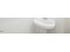 Pedestal sink provides an open, modern bathroom aesthetic at 736 Kenyon Spring Dr, Zebulon, NC 27597