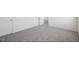 Spacious bedroom has neutral carpet and light colored walls at 736 Kenyon Spring Dr, Zebulon, NC 27597