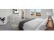 Bedroom featuring comfortable bed, lots of light and modern decor at 736 Kenyon Spring Dr, Zebulon, NC 27597