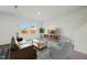 Cozy living room filled with natural light, modern furniture and neutral tones at 736 Kenyon Spring Dr, Zebulon, NC 27597