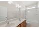 Bathroom with double sinks and tub shower combo at 7652 Channery Way, Raleigh, NC 27616