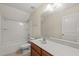 Bathroom with a tub and shower combination and a spacious sink at 7652 Channery Way, Raleigh, NC 27616