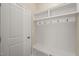 Functional mudroom area with built-in storage and seating at 7652 Channery Way, Raleigh, NC 27616