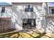 Backyard view with patio and sliding doors offer outdoor living space at 7706 Falcon Rest Cir, Raleigh, NC 27615