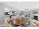 The dining area is adjacent to the kitchen and living room for easy entertaining in the open floor plan at 7706 Falcon Rest Cir, Raleigh, NC 27615