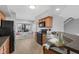 The kitchen has a window seat with decorative pillows, cabinets, and new appliances at 7706 Falcon Rest Cir, Raleigh, NC 27615