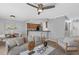 Comfortable living room with modern decor, an open layout, and access to the kitchen and dining area at 7706 Falcon Rest Cir, Raleigh, NC 27615
