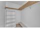 Walk-in closet with built-in shelving and storage offering ample space at 7727 Ohmann Ct, Raleigh, NC 27615