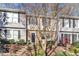 Charming townhome exteriors with well-maintained landscaping, inviting entryways, and beautiful natural light at 7727 Ohmann Ct, Raleigh, NC 27615