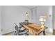 Bright home office with a vintage desk, large window, and ample workspace at 7727 Ohmann Ct, Raleigh, NC 27615