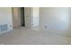 Unfinished bedroom with neutral walls and trim with access to additional rooms at 837 Kenyon Spring Dr, Zebulon, NC 27597