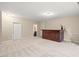 Spacious finished basement featuring wet bar, recessed lighting, and adjacent bathroom at 9 Water Stone Ct, Durham, NC 27705
