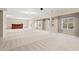 Finished basement features a wet bar, large windows, and recessed lighting at 9 Water Stone Ct, Durham, NC 27705