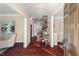 Elegant foyer with hardwood floors, crown molding, and views into other rooms, creating a welcoming entrance at 9 Water Stone Ct, Durham, NC 27705