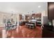 Spacious kitchen featuring stainless appliances, island, and breakfast area at 9 Water Stone Ct, Durham, NC 27705