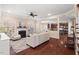 Bright living room features a fireplace, hardwood floors, and access to the kitchen at 9 Water Stone Ct, Durham, NC 27705